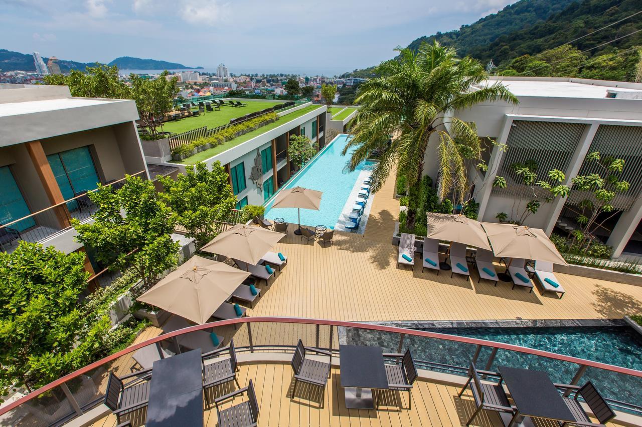 Fusion Suites Phuket Patong Екстериор снимка The swimming pool at the hotel